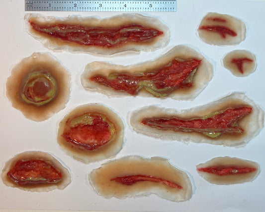 Realistic open wounds. Lacerations, Skin Tears, and open skin ulcers.  Easy to Apply and Use for EMS Scenario Training, Cosplay, & Fun.