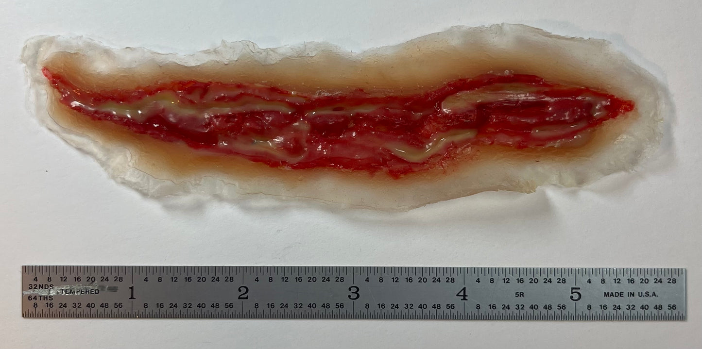 Realistic open wounds. Lacerations, Skin Tears, and open skin ulcers.  Easy to Apply and Use for EMS Scenario Training, Cosplay, & Fun.