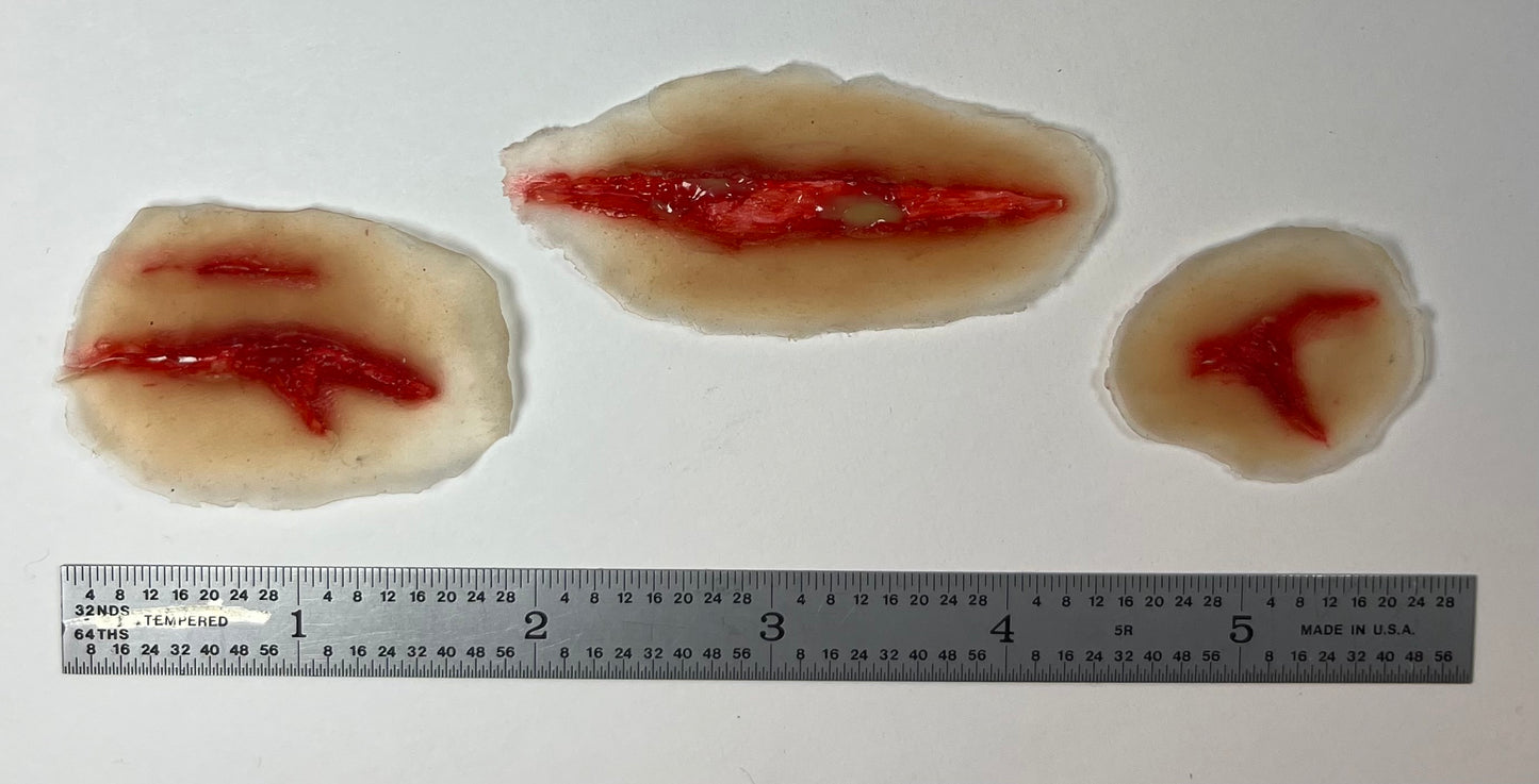 Realistic open wounds. Lacerations, Skin Tears, and open skin ulcers.  Easy to Apply and Use for EMS Scenario Training, Cosplay, & Fun.
