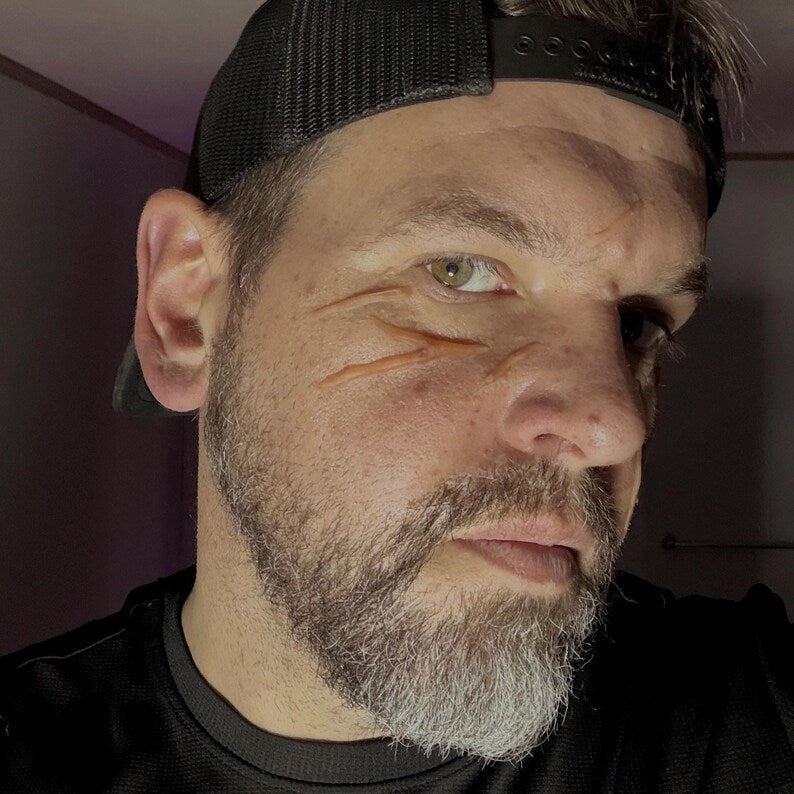 Large random cosplay body slash scars for adding to your best cosplay experience. Easy to apply. Raised 3D, healed battle wounds!