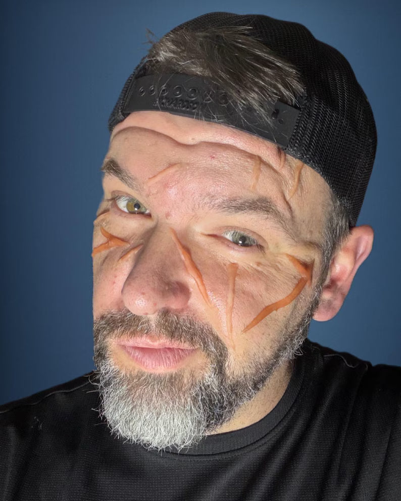 Large random cosplay body slash scars for adding to your best cosplay experience. Easy to apply. Raised 3D, healed battle wounds!