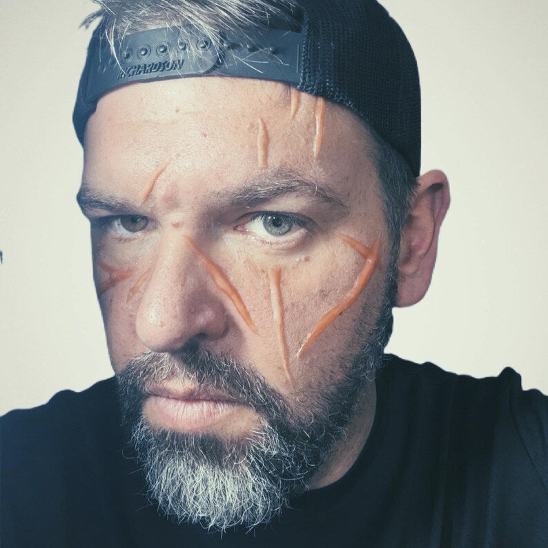 Large random cosplay body slash scars for adding to your best cosplay experience. Easy to apply. Raised 3D, healed battle wounds!