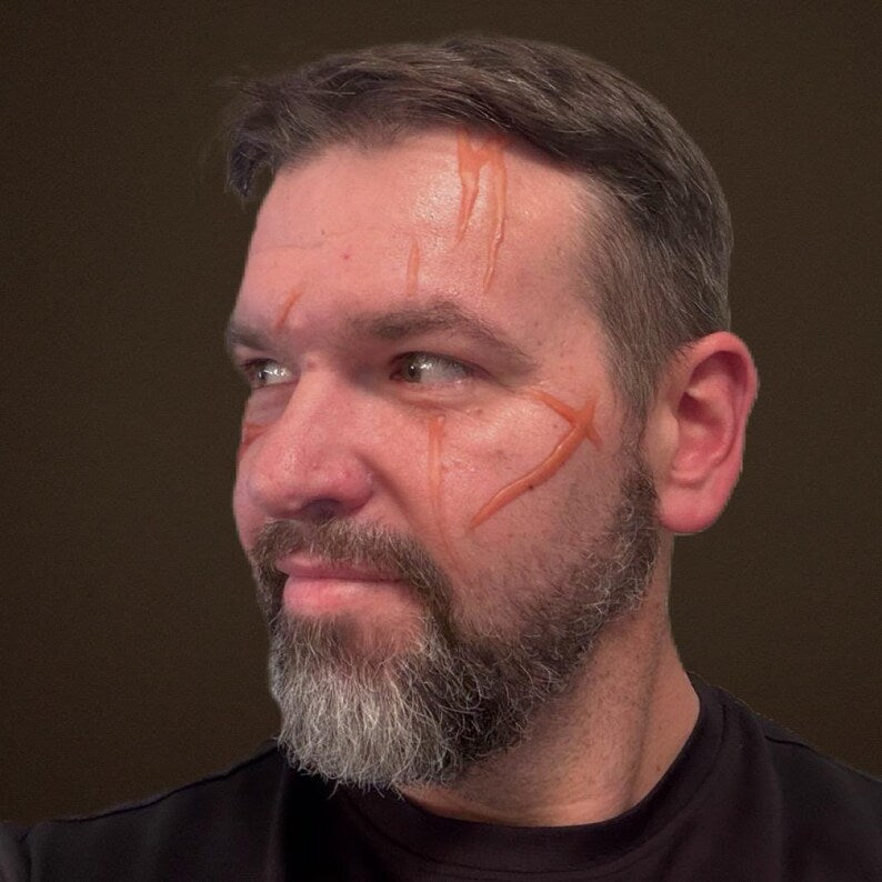 Large random cosplay body slash scars for adding to your best cosplay experience. Easy to apply. Raised 3D, healed battle wounds!
