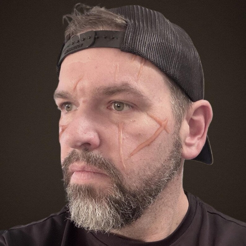Large random cosplay body slash scars for adding to your best cosplay experience. Easy to apply. Raised 3D, healed battle wounds!